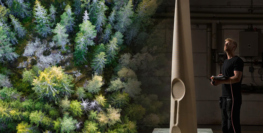 Skog och en 3D-printad kanot.